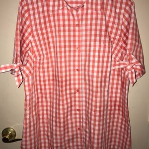 Woman’s orange and white checkered  blouse